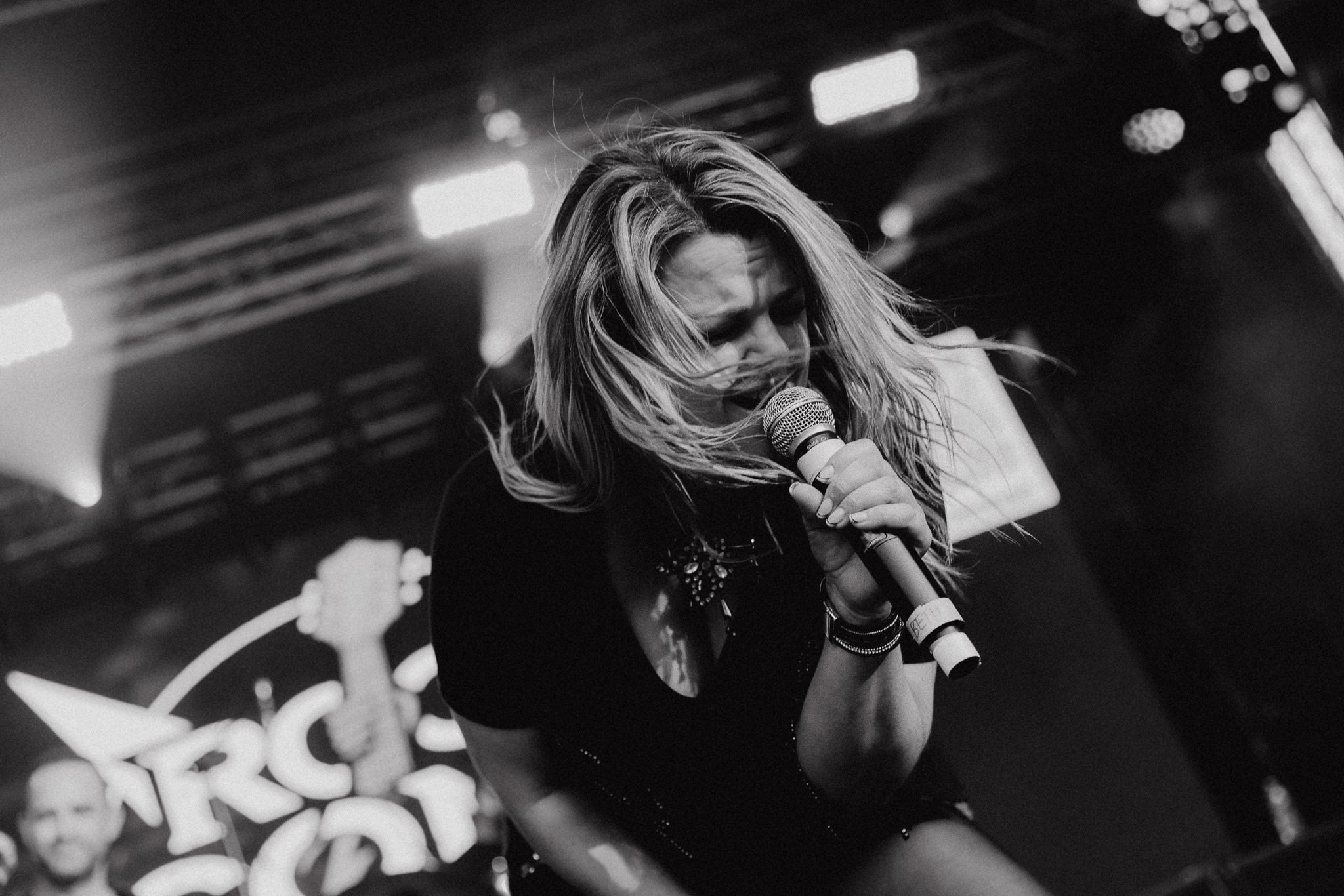 Rock Iconic performing at outdoor festival